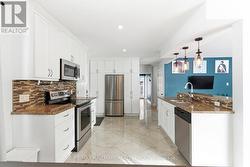 Functional kitchen with granite countertops - 