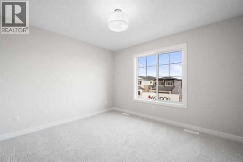 26 Walgrove Bay Se, Calgary, AB - Indoor Photo Showing Other Room