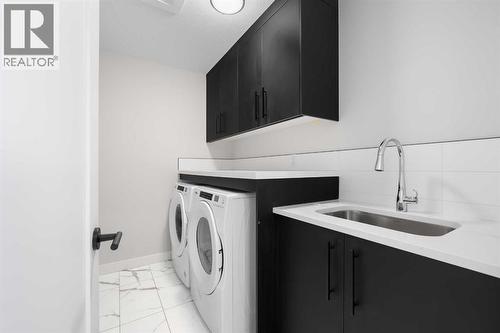 26 Walgrove Bay Se, Calgary, AB - Indoor Photo Showing Laundry Room