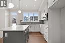 636 Sora Boulevard Se, Calgary, AB  - Indoor Photo Showing Kitchen With Upgraded Kitchen 
