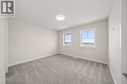 636 Sora Boulevard Se, Calgary, AB - Indoor Photo Showing Other Room