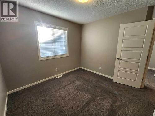 217 Panatella Walk Nw, Calgary, AB - Indoor Photo Showing Other Room