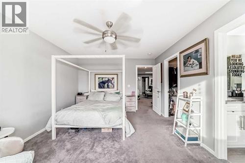 325 Sundown View, Cochrane, AB - Indoor Photo Showing Bedroom