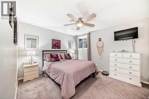 325 Sundown View, Cochrane, AB - Indoor Photo Showing Bedroom