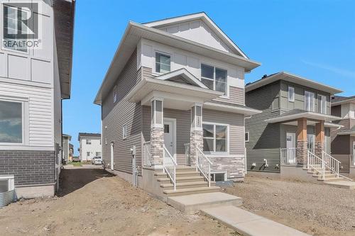 157 Dawson Wharf View, Chestermere, AB - Outdoor With Facade