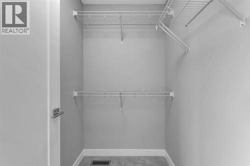 157 Dawson Wharf View, Chestermere, AB - Indoor Photo Showing Other Room