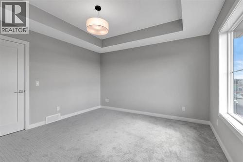 157 Dawson Wharf View, Chestermere, AB - Indoor Photo Showing Other Room