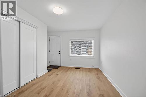 2nd Bedroom with access to the backyard - 77 Barton Street E Unit# 1, Hamilton, ON - Indoor Photo Showing Other Room