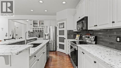 27 Cranwell Close Se, Calgary, AB - Indoor Photo Showing Kitchen With Stainless Steel Kitchen With Upgraded Kitchen