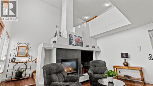 27 Cranwell Close Se, Calgary, AB - Indoor With Fireplace