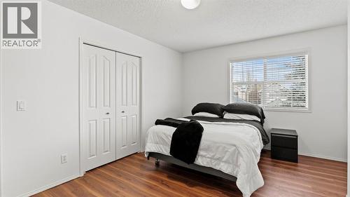 27 Cranwell Close Se, Calgary, AB - Indoor Photo Showing Bedroom