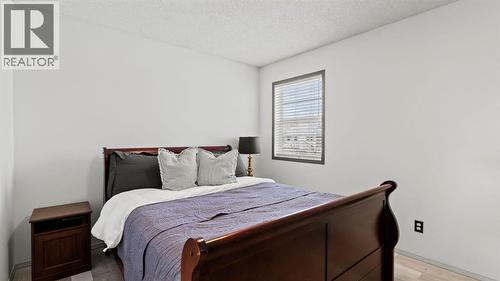 27 Cranwell Close Se, Calgary, AB - Indoor Photo Showing Bedroom