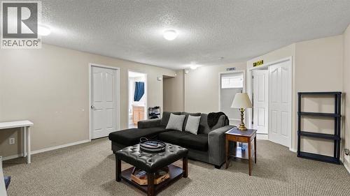 27 Cranwell Close Se, Calgary, AB - Indoor Photo Showing Living Room