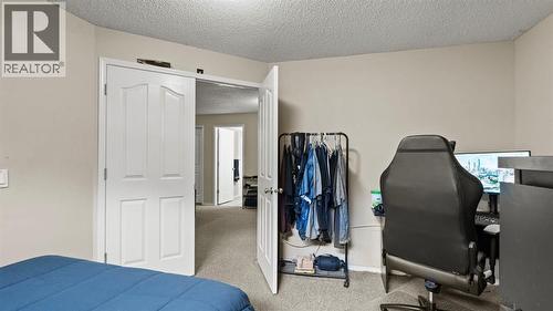 27 Cranwell Close Se, Calgary, AB - Indoor Photo Showing Bedroom