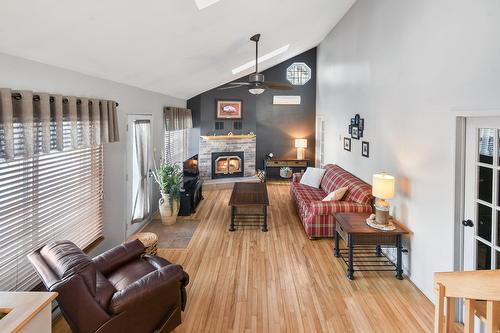 Salon - 11 Rue Karine, Saint-Jean-De-Matha, QC - Indoor Photo Showing Living Room With Fireplace