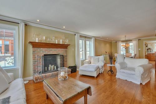 Salon - 24 Ch. De Bayon, Lorraine, QC - Indoor Photo Showing Living Room With Fireplace
