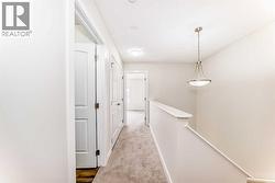 Upstairs hallway leading to 3 bedrooms - 