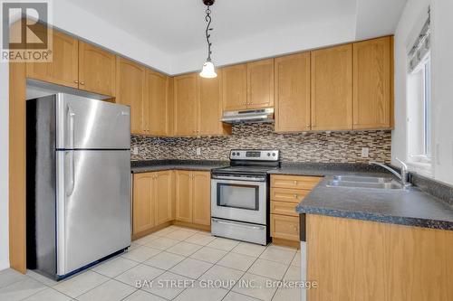 3196 Tim Dobbie Drive, Burlington, ON - Indoor Photo Showing Kitchen With Double Sink