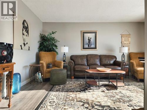 214 48 Avenue E, Claresholm, AB - Indoor Photo Showing Living Room