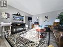 214 48 Avenue E, Claresholm, AB  - Indoor Photo Showing Living Room 