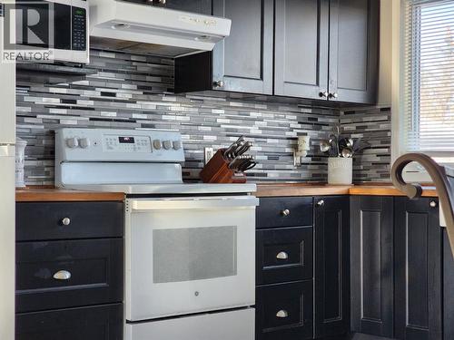 214 48 Avenue E, Claresholm, AB - Indoor Photo Showing Kitchen