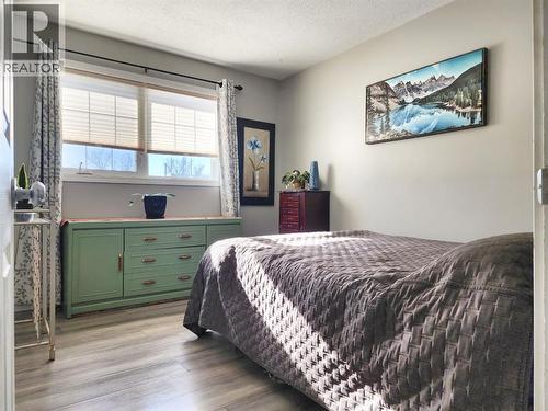 214 48 Avenue E, Claresholm, AB - Indoor Photo Showing Bedroom