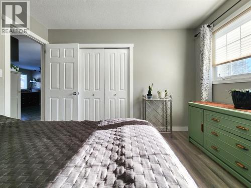 214 48 Avenue E, Claresholm, AB - Indoor Photo Showing Bedroom