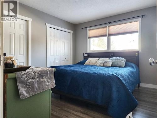 214 48 Avenue E, Claresholm, AB - Indoor Photo Showing Bedroom
