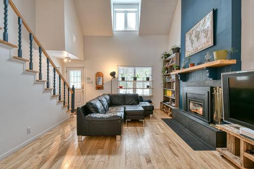Living room - 4630 Ch. De La Doncaster, Sainte-Adèle, QC - Indoor Photo Showing Living Room With Fireplace