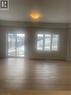 Empty room featuring plenty of natural light and light wood-style floors - 152 Queensbrook Crescent, Cambridge, ON  - Indoor Photo Showing Other Room 