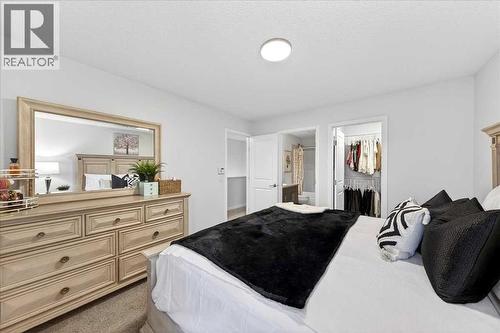 Primary bedroom - 43 Chaparral Valley Common Se, Calgary, AB - Indoor Photo Showing Bedroom