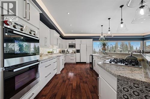 103 Stratton Park Sw, Calgary, AB - Indoor Photo Showing Kitchen With Upgraded Kitchen
