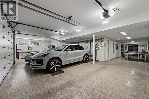 103 Stratton Park Sw, Calgary, AB - Indoor Photo Showing Garage
