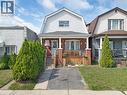 Colonial inspired home featuring a gambrel roof, a porch, brick siding, a front yard, and a shingled roof - 133 Frederick Avenue, Hamilton, ON  - Outdoor With Deck Patio Veranda With Facade 