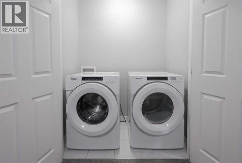 231 Windford Crescent Sw, Airdrie, AB - Indoor Photo Showing Laundry Room