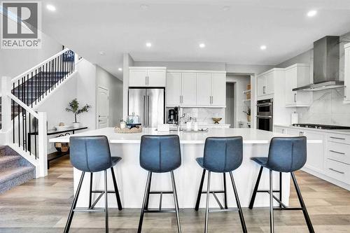 86 Edith Row Nw, Calgary, AB - Indoor Photo Showing Kitchen With Upgraded Kitchen