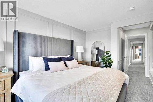 86 Edith Row Nw, Calgary, AB - Indoor Photo Showing Bedroom