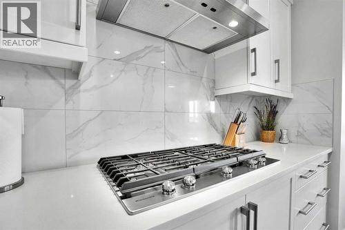 86 Edith Row Nw, Calgary, AB - Indoor Photo Showing Kitchen With Upgraded Kitchen