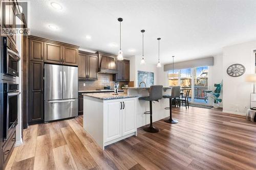 128 Auburn Bay Avenue Se, Calgary, AB - Indoor Photo Showing Kitchen With Upgraded Kitchen