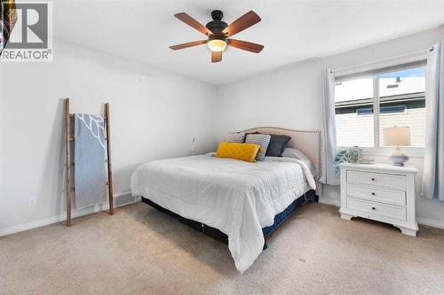 128 Auburn Bay Avenue Se, Calgary, AB - Indoor Photo Showing Bedroom