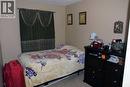 1908 Olympia Drive Se, Calgary, AB  - Indoor Photo Showing Bedroom 