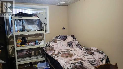 1908 Olympia Drive Se, Calgary, AB - Indoor Photo Showing Bedroom