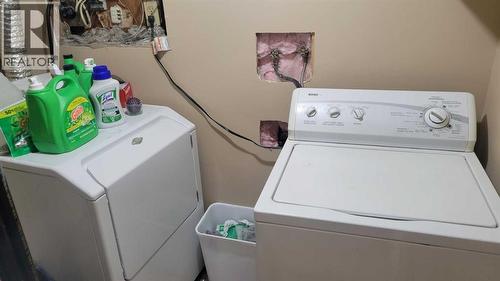 1908 Olympia Drive Se, Calgary, AB - Indoor Photo Showing Laundry Room