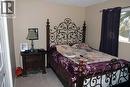 1908 Olympia Drive Se, Calgary, AB  - Indoor Photo Showing Bedroom 