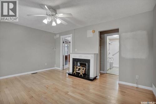 1109 11Th Street W, Saskatoon, SK - Indoor Photo Showing Living Room With Fireplace