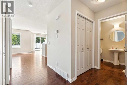 73 Rocky Ridge Heath Nw, Calgary, AB - Indoor Photo Showing Other Room