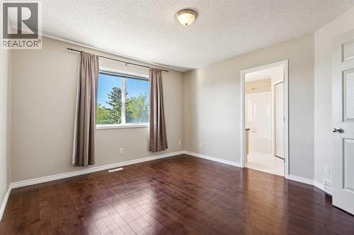 73 Rocky Ridge Heath Nw, Calgary, AB - Indoor Photo Showing Other Room