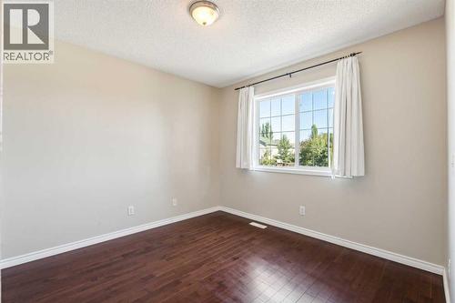 73 Rocky Ridge Heath Nw, Calgary, AB - Indoor Photo Showing Other Room