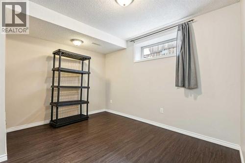 73 Rocky Ridge Heath Nw, Calgary, AB - Indoor Photo Showing Other Room