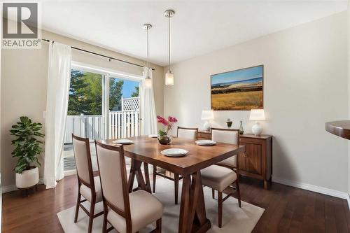 Virtually Staged - 73 Rocky Ridge Heath Nw, Calgary, AB - Indoor Photo Showing Dining Room